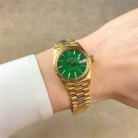 women's gold rolex with green face|green face gold band rolex.